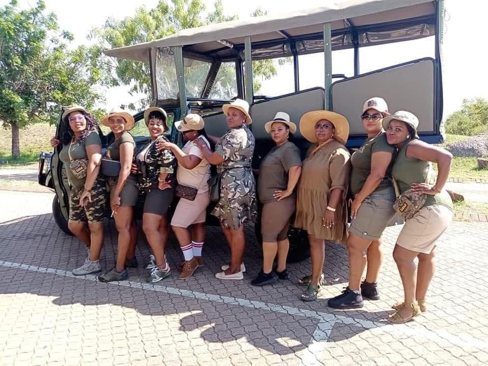 Happy travelers on safari